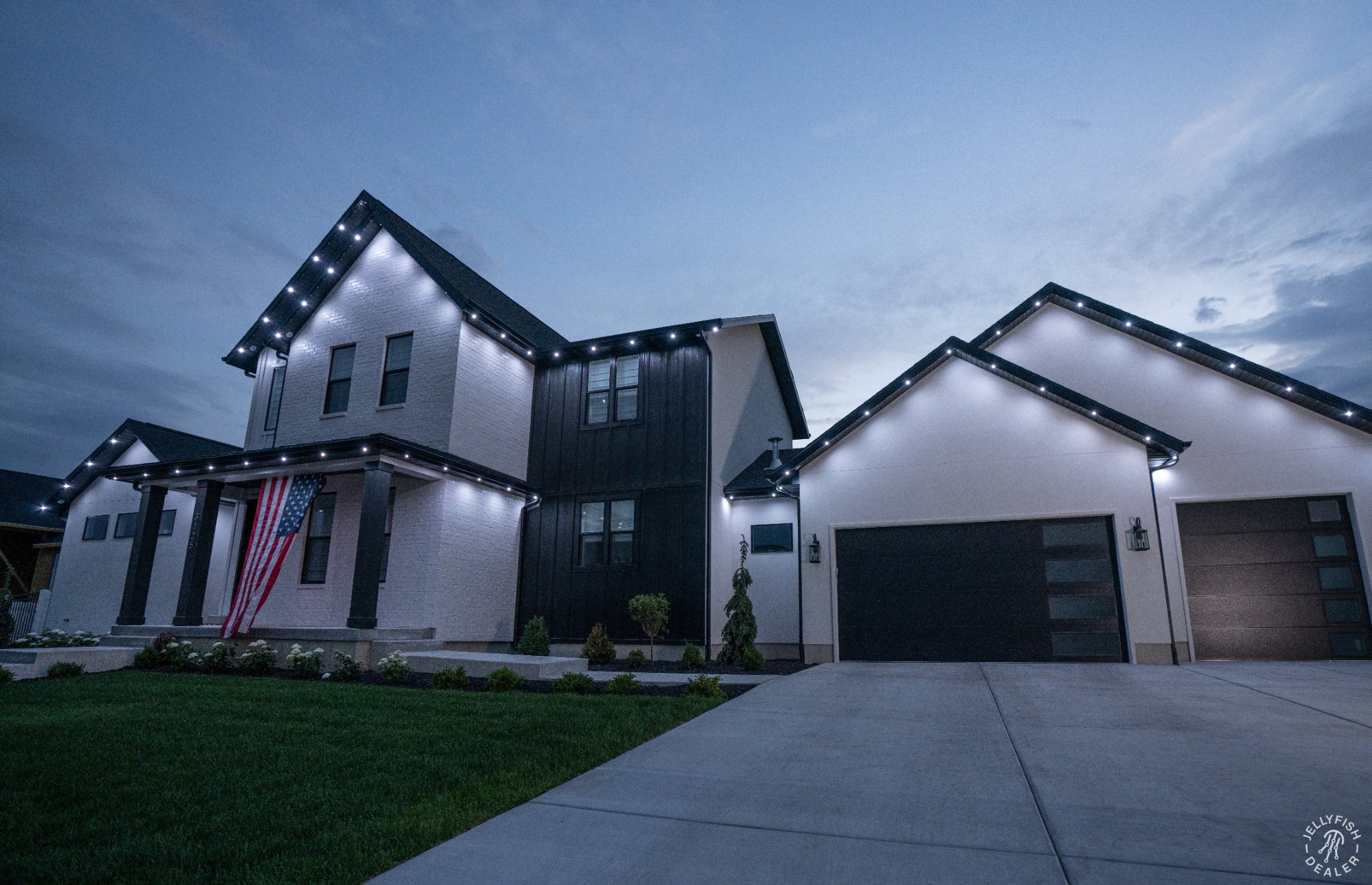 Home with American flag and white lights